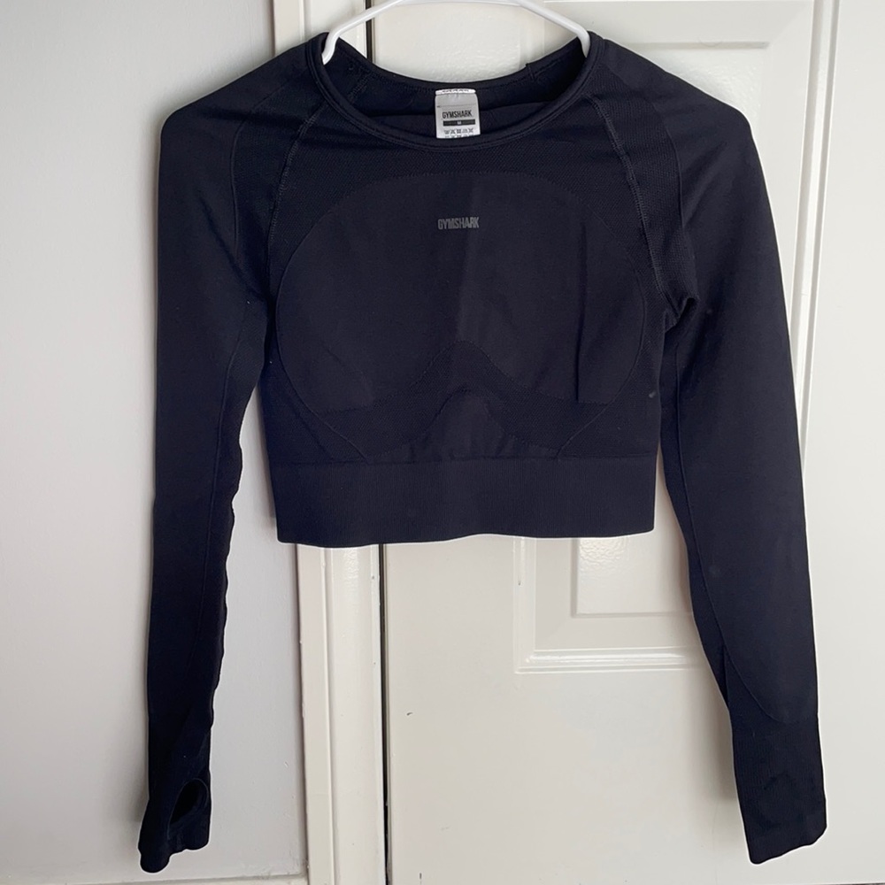 Gymshark- black, cropped, long sleeve shirt with cut out back.